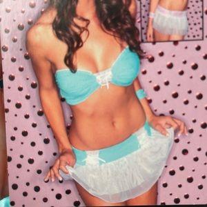 Raveware 4 pc lingerie set. Size med.NWT strapless top, skirt, hair bow& cuff